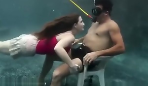 Underwater girl oral pleasure