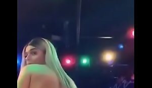 Young stripper rabble-rousing booty on stage